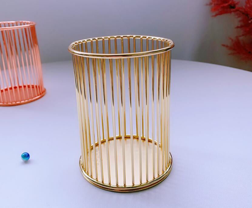 A gold multi-purpose storage bucket