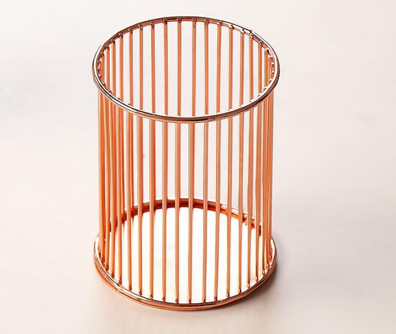 A pink Gold Multi-Purpose Storage Bucket