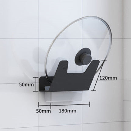 Wall-mounted glass holder with dimensions labeled on a tiled wall background