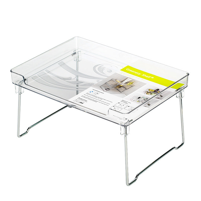 Clear plastic desk tray with metal legs on a white background