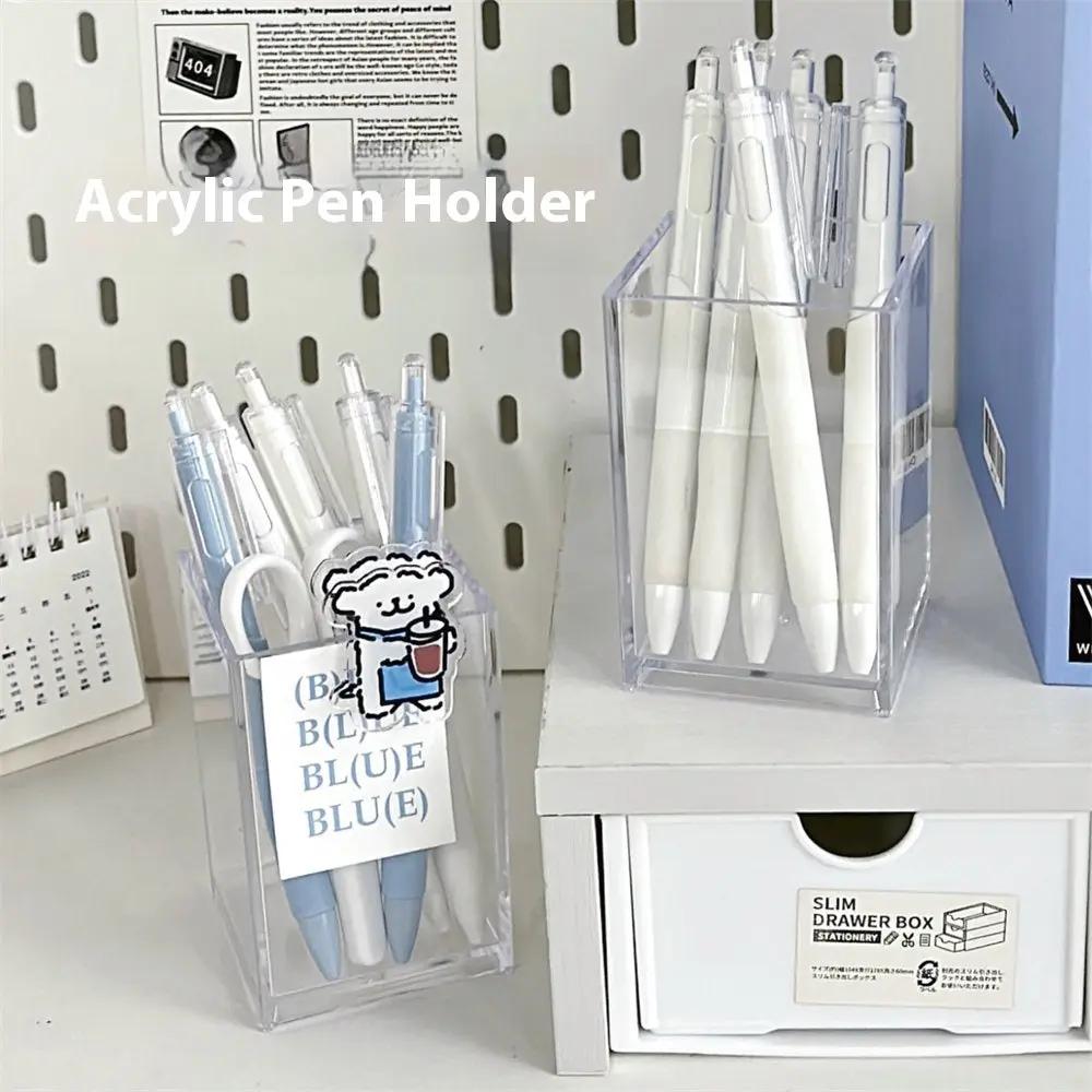 Clear acrylic storage cup placed on vanity table