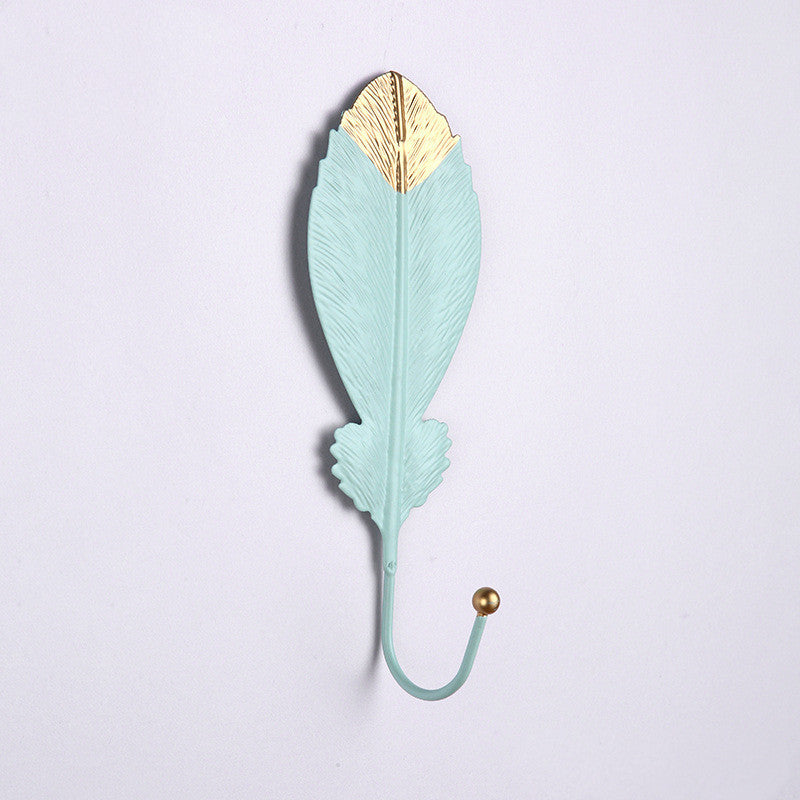 Front view of modern Nordic wall key holder blue and gold