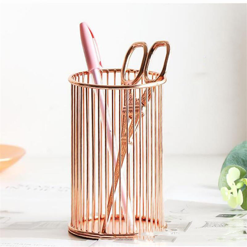 Bucket holding items on desktop