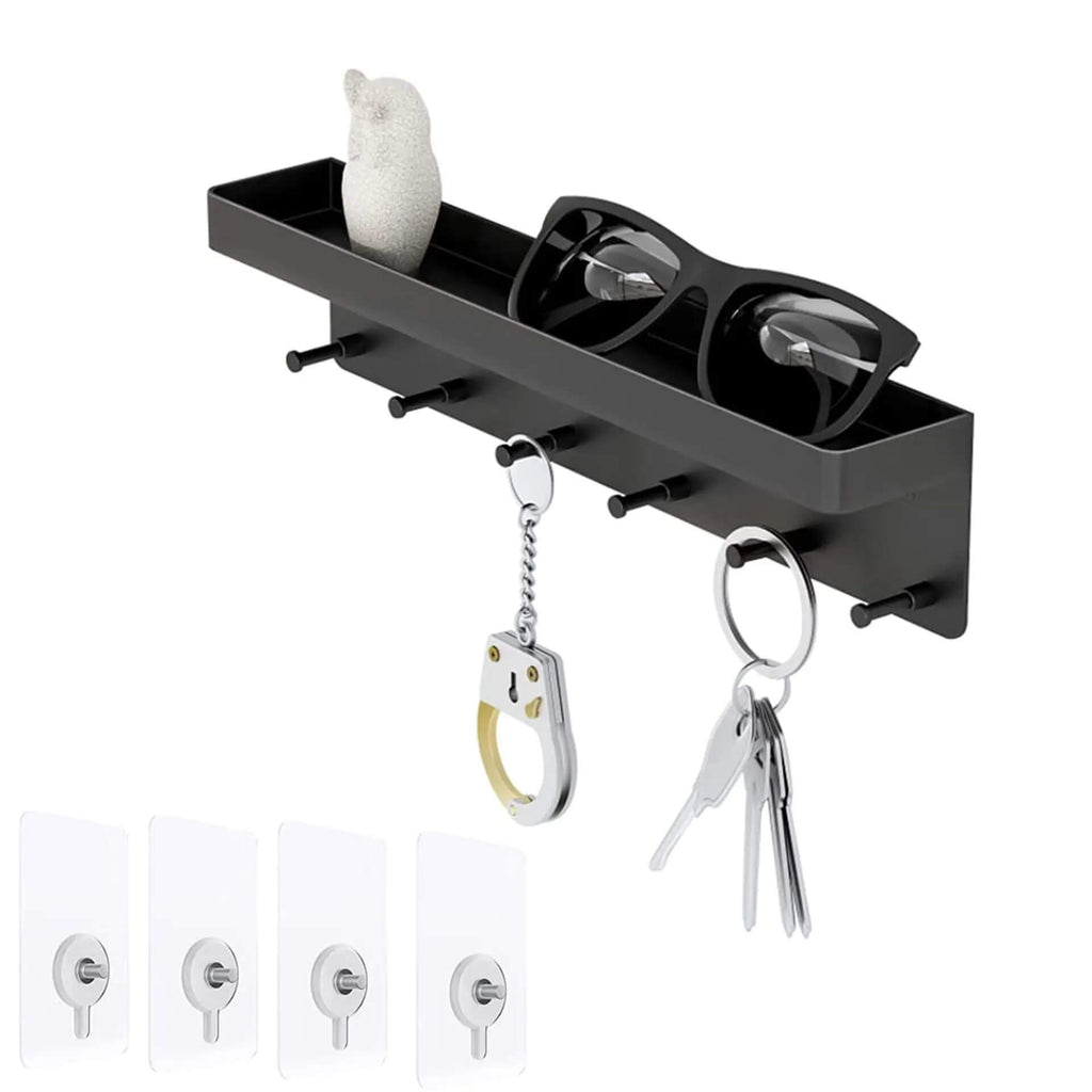 Stainless steel key holder shelf holding keys with self adisive pads